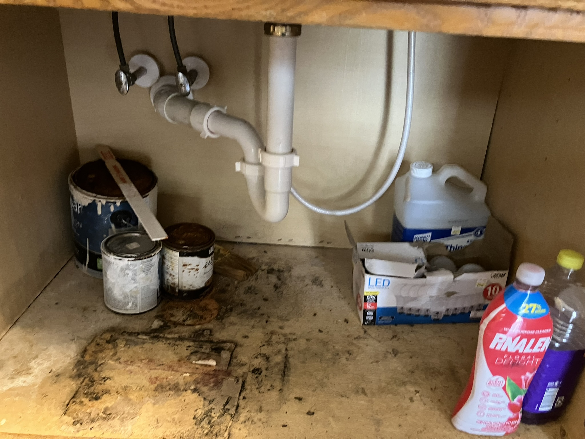 photo of the inside of a dirty cabinet